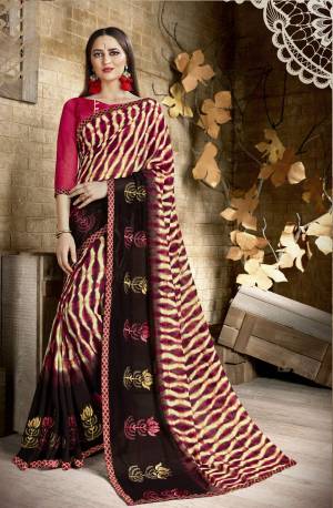 You Will Earn Lots Of Compliments Wearing This Saree In Black And Pink Color Paired With Pink Colored Blouse. This Saree Is Georgette Based Fabric Paired With Art Silk Fabricated Blouse. It Has Pretty Simple Prints And Floral Embroidery.