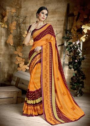 For An Attractive Look, Grab This Saree In Orange And Maroon Color Paired With Maroon Colored Blouse, This Saree Is Georgette Based Paired With Art Silk Fabricated Blouse. Both The Fabrics Ensures Superb Comfort All Day Long.