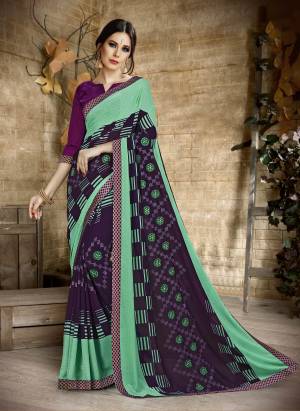 Look Beautiful In This Very Pretty Sea Green And Purple Colored Saree Paired With Purple Colored Blouse. This Saree Is Georgette Based Fabric Paired With Art Silk Fabricated Blouse. Both The Fabrics Are Light Weight And Easy To Carry All Day Long.
