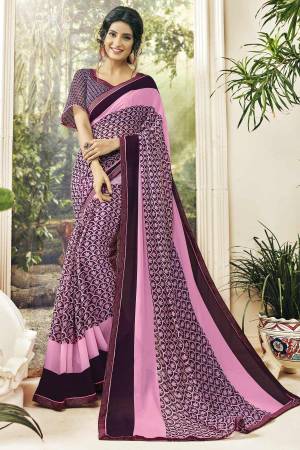 Look Pretty In This Pink And Purple Color Paired With Purple Colored Blouse. This Saree And Blouse are Georgette Based Which Is Light Weight And Easy To Carry All Day Long. Buy This Pretty Saree Now.