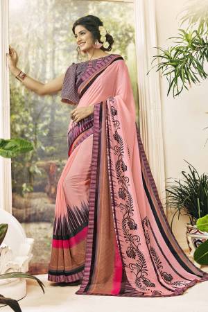 You Will Definitely Earn lots of Compliments Wearing This Pretty Saree In Light Pink Color Paired With Contrasting Purple Colored Blouse. This Saree And Blouse Are Georgette Based Fabric Beautified With Prints All Over. Buy Now.