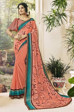 A Must Have Shade In Every Womens Wardrobe Is Here With This Saree In Peach Color Paired With Peach Colored Blouse. This Saree and Blouse Are Georgette Based Beautified With Prints All Over. 