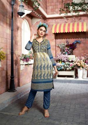 Flaunt Your Rich and Elegant Taste Wearing This Readymade Kurti In Beige And Blue Color Fabricated On Tussar Art Silk Beautified With Prints And Thread Work. This Kurti Is Light Weight And Ensures Superb Comfort All Day Long.
