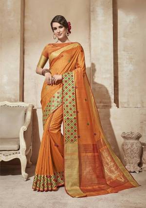 Orange Color Induces Perfect Summery Appeal To Any Outfit, So Grab This Cotton Silk Based Saree In Orange Color Paired With Orange Colored Blouse. It Has Pretty Thread Embroidery Making The Saree Attractive. Buy Now.