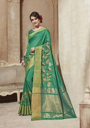 Add This Lovely Designer Saree To Your Wardrobe In Sea Green Color Paired With Sea Green Colored Blouse. This Saree And Blouse Are Cotton Silk based Fabric Beautified With Thread Work.