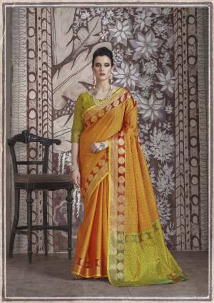 Celebrate This Festive Season Wearing This Attractive Yellow Colored Silk Saree Paired With Contrasting Pear Green Colored Blouse. This Saree And Blouse Are Fabricated On Banarasi Muslin Silk Beautified With Weave All Over. Buy Now.