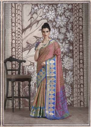 A Must Have Shade In Every Womens Wardrobe Is Here With This Designer Saree In Dusty Pink Color Paired With Contrasting Blue Colored Blouse. This Saree And Blouse Are Banarasi Muslin Silk Based Fabric Beautified With Weave All Over. Buy Now.