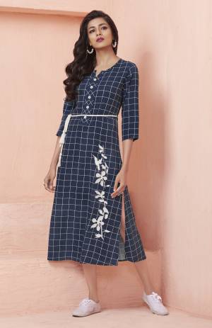 Enhance Your Personality Wearing This Designer Readymade Kurti In Navy Blue Color Fabricated On Rayon Beautified With Checks Prints And Thread Work. This Kurti Durable And Soft Towards Skin Which Is Easy To carry All Day Long.