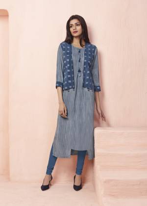 Grab This Pretty Kurti With Jacket In Grey And Blue Color Fabricated On Rayon. Its Pretty Jacket Is Beautified With Ikkat Prints. Also It Is Light Weight And Easy To Carry All Day Long.