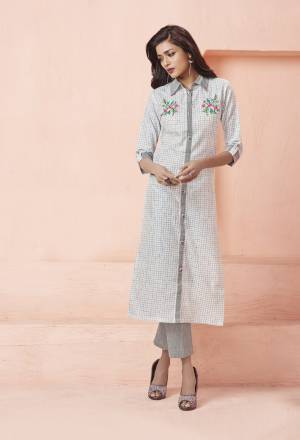 Simple and Elegant Looking Designer Readymade Kurti Is Here In Off-White Color Fabricated On Linen. It Is Beautified With Checks Prints And Multi Colored Floral Thread Work. It Is Available In All Sizes. Buy Now.