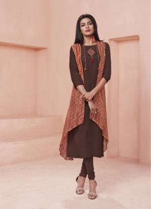 For a Bold And Beautiful Look, Grab This Designer Readymade Kurti In Brown And Rust Color Fabricated On Rayon And Tussar Silk. This Kurti Is Beautufied With Prints And thread Work. Buy Now.