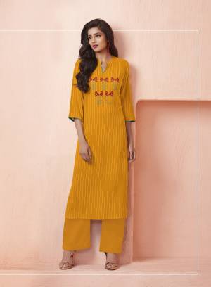 Celebrate This Festive Season With Beauty And Comfort Wearing This Designer Readymade Kurti In Musturd Yellow Color Beautified With Prints And Thread Work. This Kurti Is Light Weight And Easy To Carry All Day Long. Buy Now.