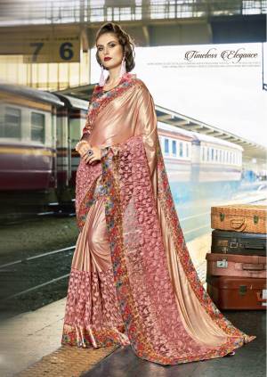 Look Pretty Wearing This Heavy Designer Saree In Dusty Pink Color Paired With Multi Colored Blouse. This Saree Is Fabicated On Lycra And Net Paired With Art Silk Fabricated Printed Blouse. This Pretty Looking Saree Has Attractive Floral Prints And Fancy Work. 