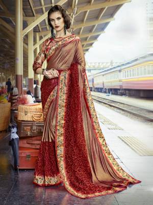 For A Royal Look, Grab This Dark Shade In Maroon Colored Saree Paired With Multi Colored Blouse. This Saree Is Lycra And Net Based Fabric Paired With Art Silk Fabricated Blouse. It Is Beautified With Prints And Fancy Work Which Will earn You Lots Of Compliments From Onlookers. 
