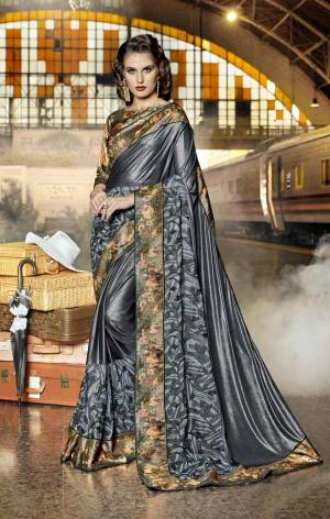 Adorn A New And Unique Look Wearing This Designer Saree In Grey Color Paired With Paired With Multi Colored Blouse, This Saree Is Fabricated On Lycra And Net Paired With Art Silk Fabricated Blouse. It Has Pretty Floral Prints And Fancy Work. Buy Now.