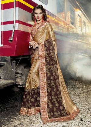 You Will Definitely Earn Lots Of Compliments Wearing This Designer Saree In Golden Color Paired With Contrasting Peach Colored Blouse. This Saree Is Fabricated On Lycra And Net Paired With Art Silk Fabricated Blouse. It Is Beautified With Prints And Fancy Work Over The Saree. buy Now.