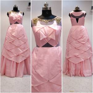 Look Very Pretty Wearing This Layered Pattern Designer Readymade Gown In Pink Color Fabricated On Oragenza. This Gown Has Attractive Pattern Work With Hand Work Over The Neckline, Buy Now.