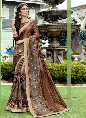 Enhance Your Personality, Wearing This Heavy Designer Saree In Brown Color Paired With Brown Colored Blouse. This Saree IS Fabricated On Lycra And Net Paired With Art Silk Fabricated Blouse. This Fabric Itself Gives A Heavy Look To Your Personality, Buy This Designer Saree Now.