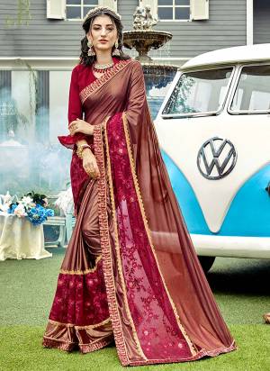 For A Royal Look, Grab This Heavy Designer Saree In Maroon Color Paired With Maroon Colored Blouse. This Saree IS Lycra And Net Based Paired With Art Silk Fabricated Blouse. This Saree Is Light Weight, Easy To Drape And Carry All Day Long.