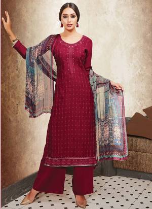 For A Royal Heavy Look, Grab This Dress Material In Maroon Color Paired With Contrasting Grey Colored Dupatta. Its Top And Bottom Are Satin Fabricated Paired With Chiffon Dupatta. Get This Dress Material Stitched As Per Your Desired Fit And Comfort. Buy Now.