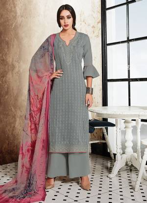 Flaunt Your Rich and Elegant Look Wearing This Designer Suit In Grey Color Paired With Contrasting Pink Colored Dupatta. This Dress Material Is Satin Based Fabric Paired With Chiffon Dupatta. Buy This Now.