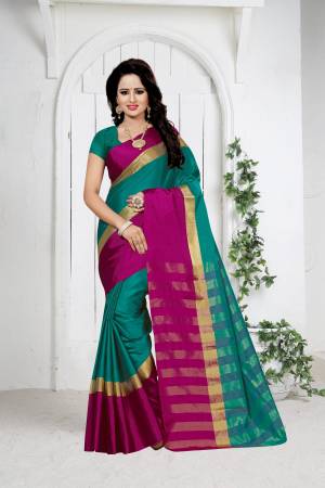 Add This New Shade To Your Wardrobe With This Poly Cotton Based Saree In Teal Green Color Paired With Teal Green Colored Blouse. This Saree Has Black And Gold Patta Which Is Giving An Attractive Look.