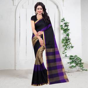 Grab This Poly Cotton Based Fabric Saree In Black & Purple Color Paired With Black Colored Blouse. This Plain Saree Gives An Elegant Look To Your Personality. Buy Now.