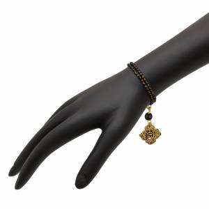 Grab This Very Pretty And Elegant Looking Bracelet Cum Bangle. This can Also Be Called As Trendy Mangalsutra To Wear In Hand Instead Of Neck. This Pretty Bracelet Has Cute Hangings In Golden Color. Buy Now
