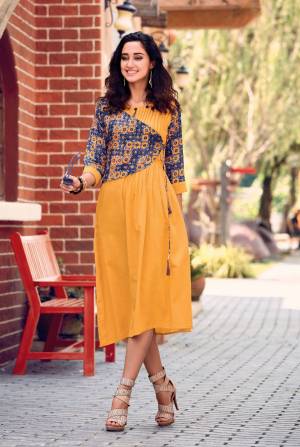 For Your Semi-Casuals Or Festive Wear, So Grab This Designer Readymade Kurti In Musturd Yellow Color Fabricated On Cotton Satin Beautified With Prints. Buy This Kurti Now.