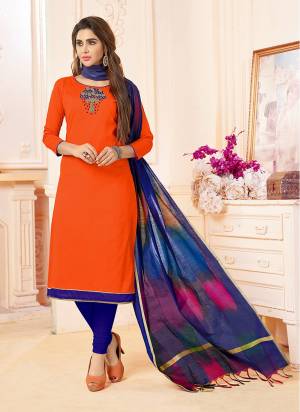 Grab This Designer Dress Material In Orange Colored Top Paired With Contrasting Dark Blue Colored Bottom And Multi Colored Dupatta. Its Top IS Fabricated On Cotton Slub Paired With Cotton Bottom And Banarasi Dupatta. It Is Beautified With Hand Work Over Its Top. Buy Now.