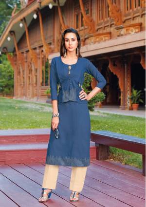 Here Is A Designer Readymade Kurti In Blue Color Fabricated On Silk Cotton. This Kurti Is Plain And Played With Fabric To Give An Attractive Pattern. It Is Available In Regular Sizes. Buy Now.