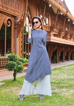 Add This Lovely Shade To Your Wardrobe With This Designer Readymade Kurti In Dark Grey Color Fabricated On Silk Cotton. This Readymade Kurti Is Available In All Regular Sizes and Esnures Superb Comfort and Gives A Rich Look To Your Personality. 