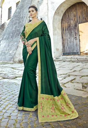 Dark Shades Suits Everyone And Everyseason, So Grab This Designer Saree In Pine Green Color Paired With Light Green Colored Blouse. This Saree Is Fabricated On Satin Silk Paired With Art Silk Blouse. Its Fabric Ensures Superb Comfort Throughout The Gala.
