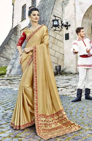 Flaunt Your Rich and Elegant Taste Wearing This Designer Saree In Beige Color Paired With Beige Colored Blouse. This Saree Is Satin Silk Based Fabric Paired With Art Silk Blouse. It Is Easy Drape, Durable And Easy To Care For.