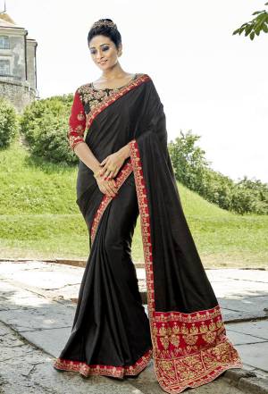 For A Bold And Beautiful Look, Grab This Heavy Designer Saree In Black Color Paired With Black Colored Blouse. This Saree Is Fabricated On Satin Silk Paired With Art Silk Fabricated Blouse. Buy This Designer Saree Now.