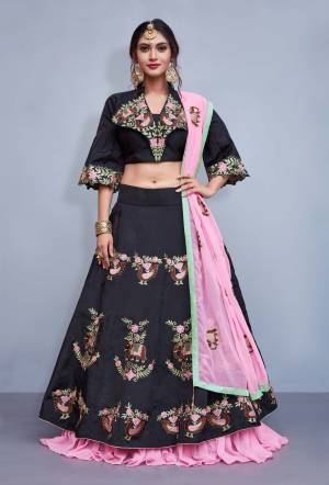 Here Is A Pretty Collection For The Bridesmaid, Grab This Designer Lehenga Choli In Black Color Paired With Pink Colored Dupatta. This Heavy Lehenga Choli Is Art Silk Based Fabric Paired With Georgette Dupatta. Buy This Readymade Lehenga Now.
