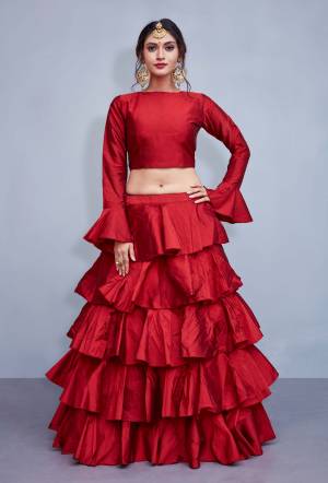 Adorn The Pretty Angelic Look With This Frill Patterned Designer Readymade Lehenga Choli In Red Color. This Lehenga Choli IS Art Silk based Fabric With No Dupatta. Buy This Now.