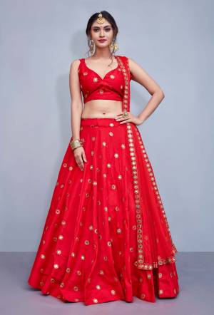 You Will Definitely Earn Lots Of Compliments Wearing This Designer Lehenga Choli In Red Color Paired With Red Dupatta.  This Readymade Lehenga Choli Is Fabricated On Art Silk Paired With Net Dupatta, It Is Beautified With Attractive Mirror Work.