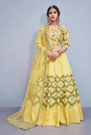 Celebrate This Festive Season With Beauty And Comfort Wearing This Designer Lehenga Choli In Light Yellow Color Paired With Light Yellow Colored Dupatta. This Readymade Lehenga Choli Is Fabricated On Art Silk Paired With Net Dupatta. Buy Now.