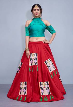 Look Trendy Wearing This Designer Lehenga Choli This Festive Season With Very Demanding Cold Shoulder Pattern. Its Blouse Is In Turquoise Blue Color Paired With Contrasting Red Colored Lehenga. Its Blouse Is Fabricated On Nylon Silk Paired With Art silk Lehenga. 