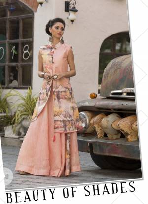 Look Pretty In This Designer Readymade Gown In Light Peach Color. This Gown Is Fabricated On Art Silk Beautified With Digital Prints All Over. Buy Now.