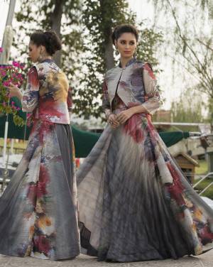 Flaunt Your Rich and Elegant Taste Wearing This Designer Gown In Dark Grey Color Fabricated On Art Silk . It Is Beautified With Digital Prints All Over. 