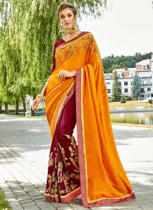 Beat The Heat Wearing This Bright Colored Saree In Orange And Maroon Color Paired With Maroon Colored Blouse. This Saree Is Fabricated On Silk And Georgette Paired With Art Silk Fabricated Blouse. It Has Attractive Embroidery All Over Its Panel. 