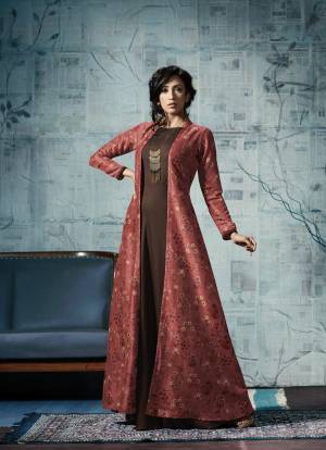 Another Designer Gown With Jacket Is Here In Brown And Red Color Fabricated On Tussar Silk And Rayon. Its Lovely Color Pallete Wirll Earn You Lots Of Compliments From Onlookers. 