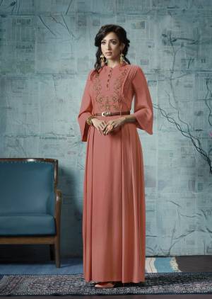 For The Next Party, Grab This Beautiful Designer Floor Length Gown In Dark Peach Color Fabricated On Rayon Slub Beautified With Embroidered Yoke And Bell Sleeves. Buy Now.