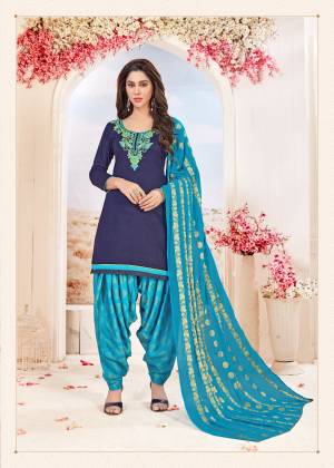 Go With This Shades Of Blue With This Designer Dress Material In Navy Blue Color Paired With Blue Colored Bottom And Dupatta. Its Top IS Cotton Fabricated Paired With Cotton Jacquard Bottom And Chiffon Jacquard Dupatta. Buy Now.