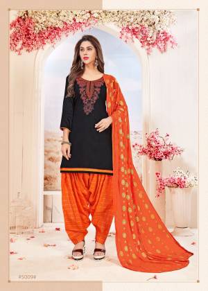 Shien Bright In This Dress Material In Black Colored Top Paired With Orange Colored Bottom And Dupatta. Its Top And Bottom Are Cotton Based Paired With Chiffon Dupatta. Buy Now.