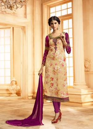 Grab This Semi-Stitched Suit In Beige Colored Top Paired With Purple Colored Bottom And Dupatta. Its Top Is Fabricated On Georgette Brasso Paired With Santoon Bottom And Chiffon Dupatta. It Is Beautified With Prints And Embroidery Over The Top.