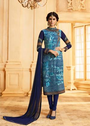 Get Ready For The Upcoming Festive And Wedding Season With This Designer Semi-Stitched  Suit In Blue Color Paired With Navy Blue Colored Bottom And Dupatta. Its Top Is Fabricated On Georgette Brasso Paired With Santoon Bottom And Chiffon Dupatta. Buy Now.