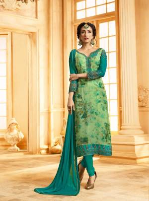 Celebrate This Festive Season Wearing This Designer Semi-Stitched Suit In Pastel Green Colored Top Paired With Blue Colored Bottom And Dupatta. Its Top Is Georgette Brasso Based Fabric Paired With Santoon Bottom And Chiffon Dupatta. Buy This Semi-Stitched Suit Now.